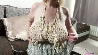 Mature Sally's huge tits in a skimpy top which leaves nothing to the imagination on lovepornstars.com